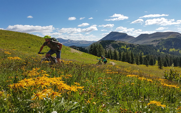 The “Easy” Way To Experience One of the World’s Most Extreme Mountain Bike Rides