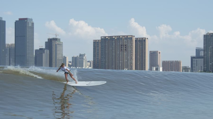 Urban surfing: From Munich to China, daredevils ride inner-city rivers