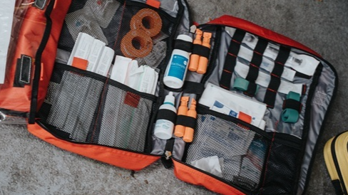 What should be in a travel first aid kit